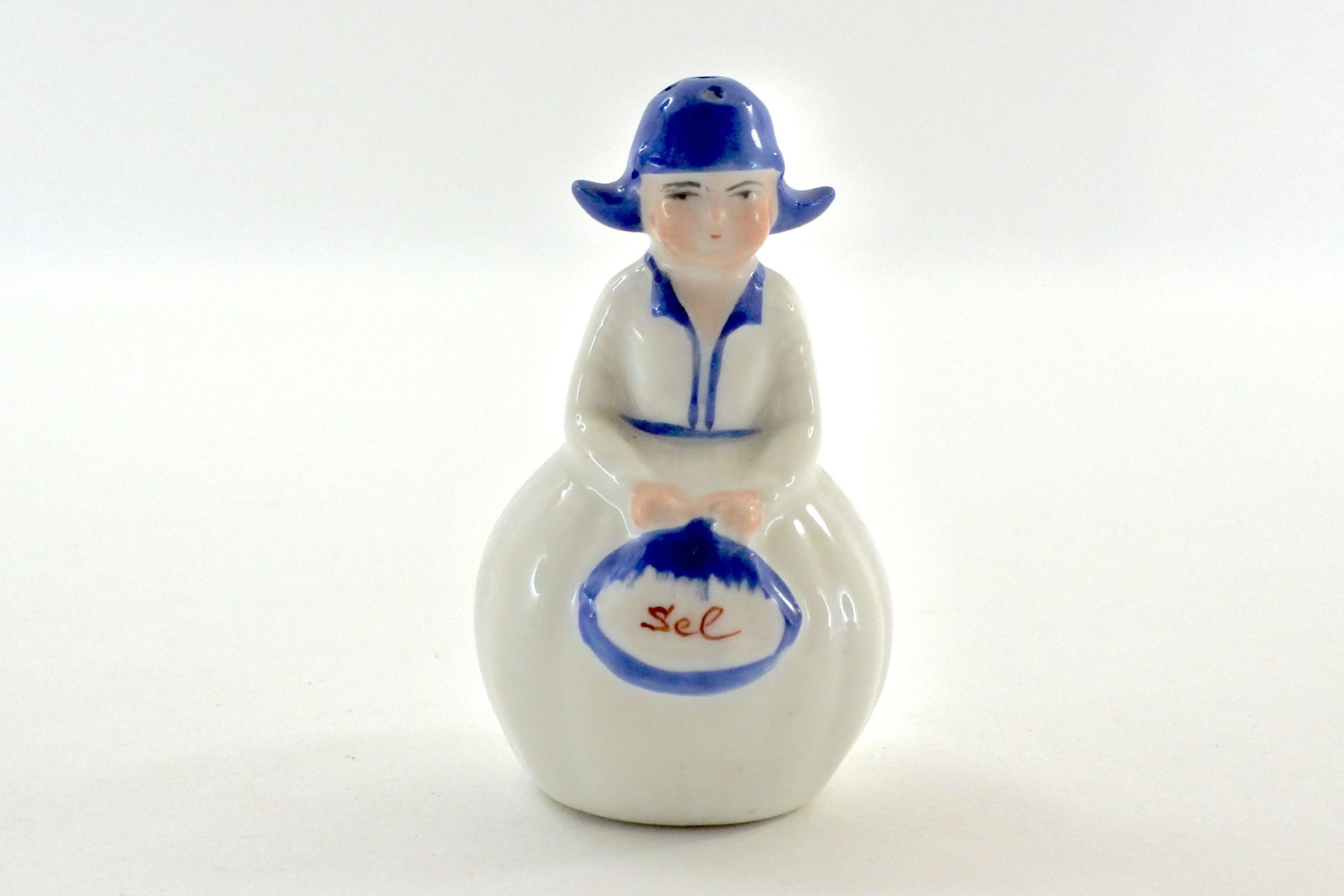 Portasale in ceramica bianca e blu a forma di olandesina