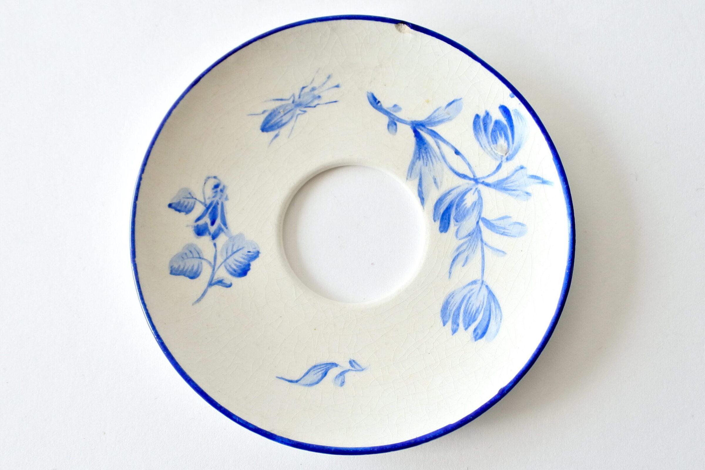 Bobeche raccoglicera in ceramica bianca con decoro blu